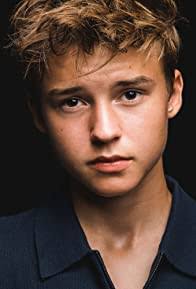Discover Maxwell Jenkins Biography (2026), age, height, parents, movies, net worth, UCLA education, Lost in Space career, Reacher role, family background, and full life story.
