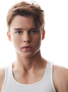 Discover Maxwell Jenkins Biography (2026), age, height, parents, movies, net worth, UCLA education, Lost in Space career, Reacher role, family background, and full life story.